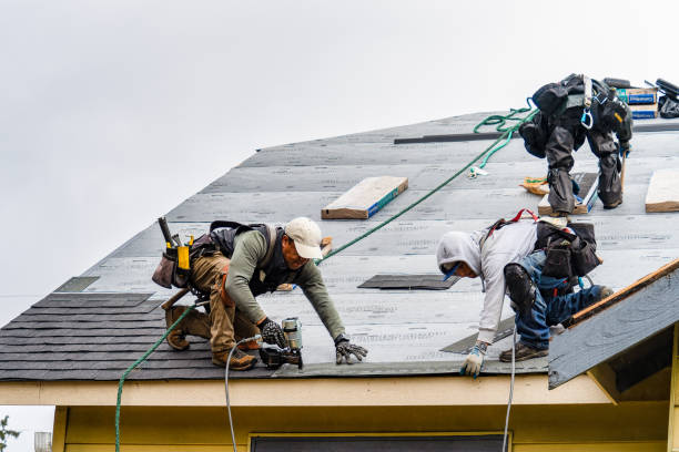 Professional Roofing technician working in South Willington, CT